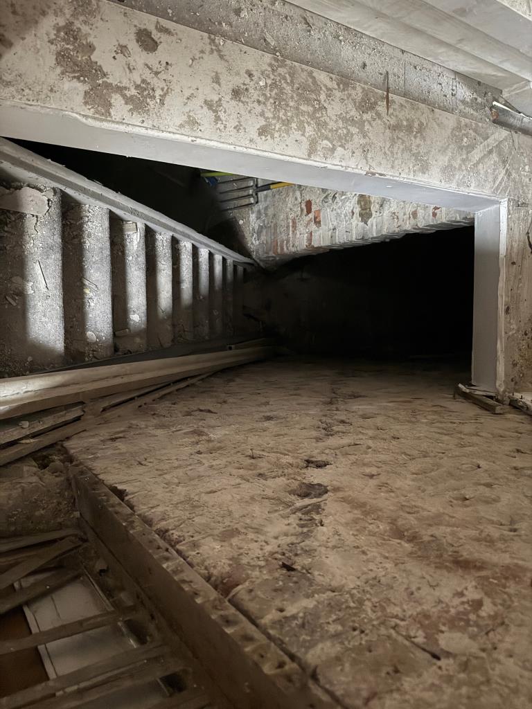 Lot: 52 - FREEHOLD SHOP AND UPPER PARTS IN NEED OF COMPLETE REFURBISHMENT - View of stairs down to lower ground floor